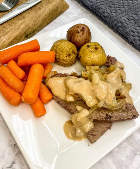 10 Liver & Onions, Mushroom Sauce, Roasted Potatoes & Veg.