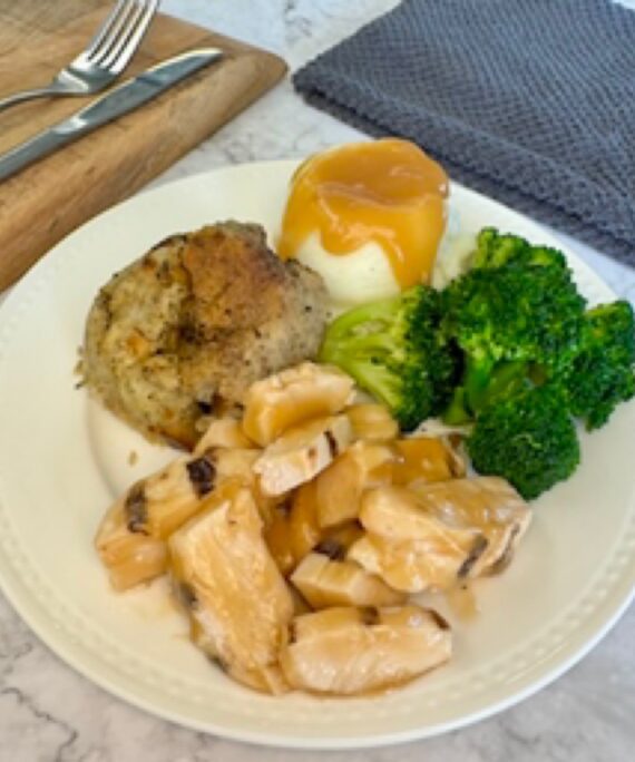 23 Chicken in Gravy, Stuffing, Mashed Potatoes & Veg.